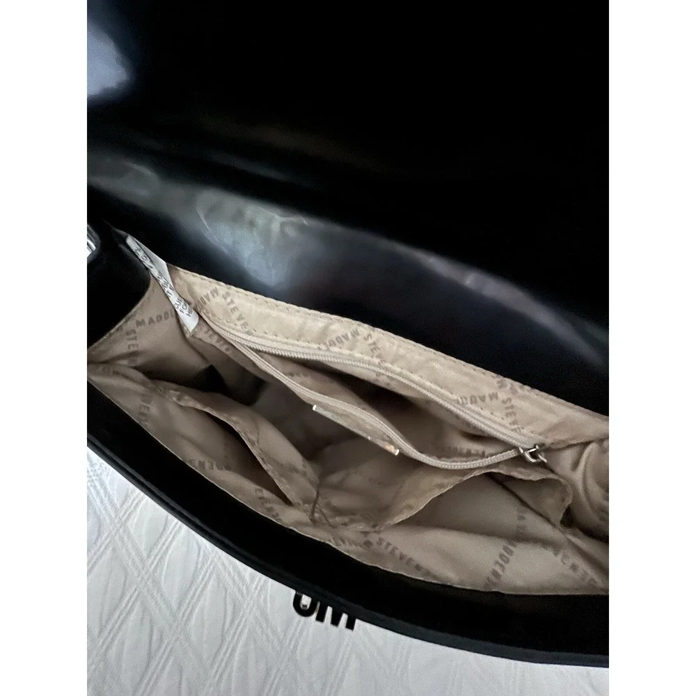 Steve Madden bag, sizes 10 × 8 with adjustable‎ strap,,black